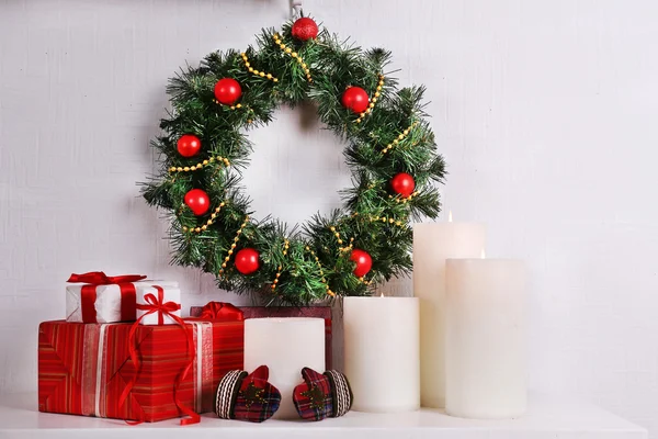 Christmas wreath, candles and presents
