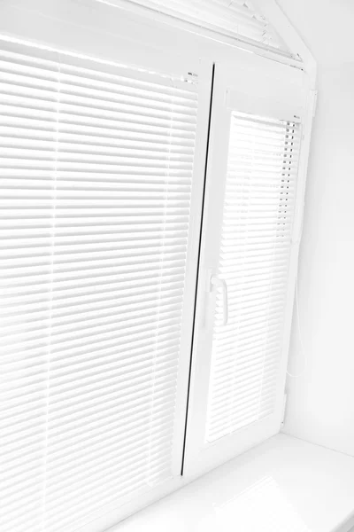 White window with blinds