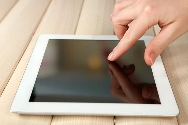 Hand using tablet PC