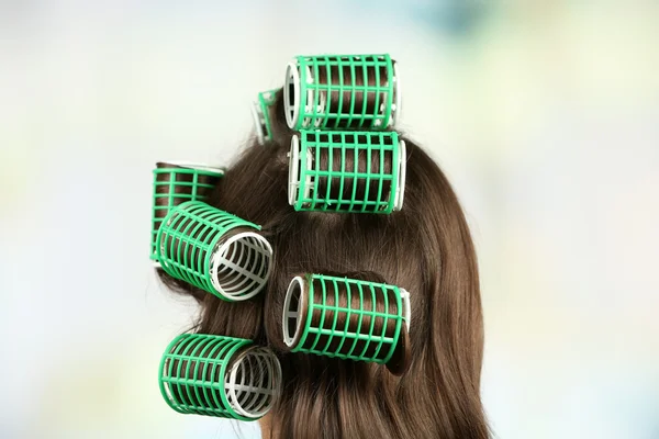 Long hair during hair dressing with curler