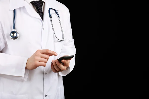 Doctor working with mobile phone