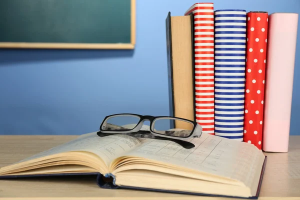 Textbooks with glasses