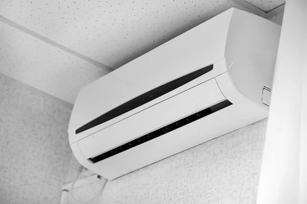 Air conditioner on wall background