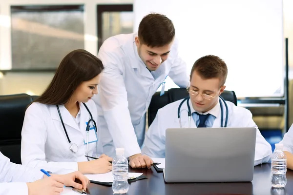 Medical workers working in conference room