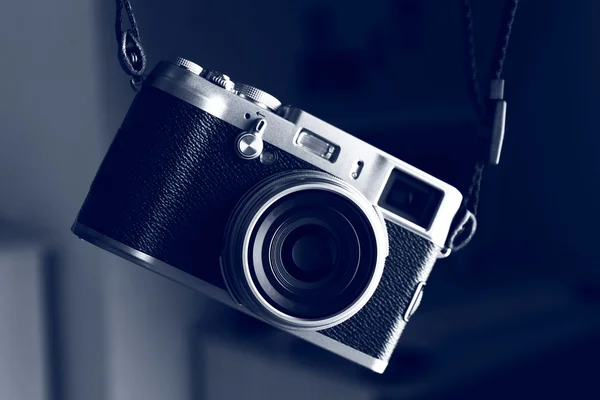 Retro camera in shades of grey, closeup