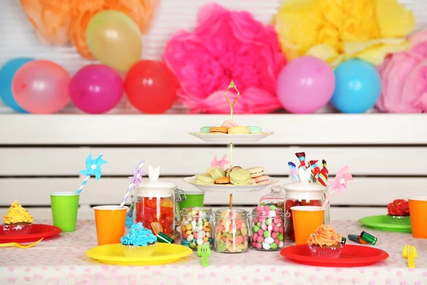 Prepared birthday table with sweets for children party