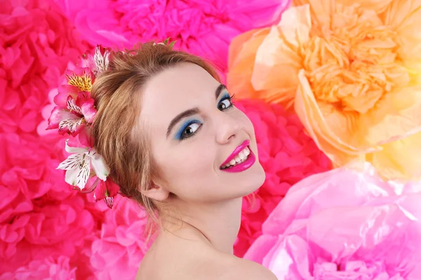 Young woman with flowers