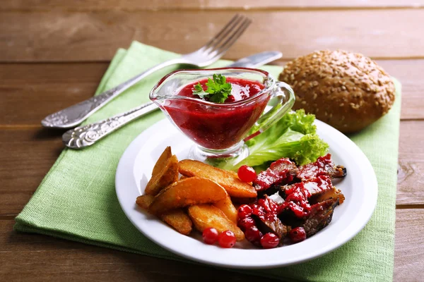Beef with cranberry sauce
