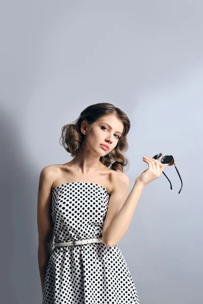 Portrait of beautiful model in dots dress