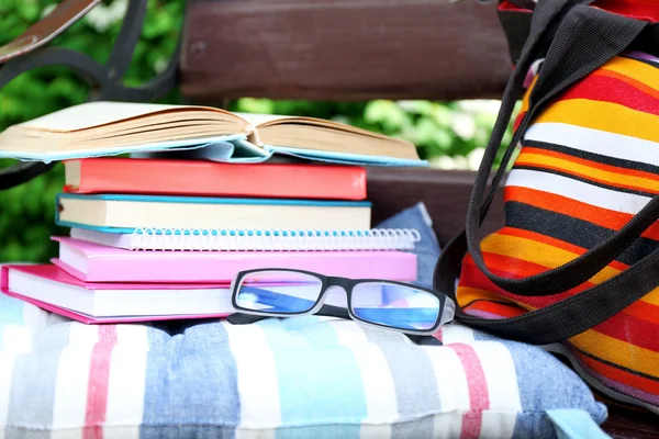 Books, glasses and bag