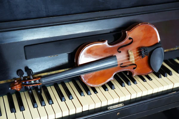 Violin on piano keys