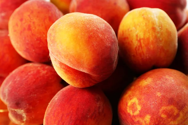 Ripe peaches background