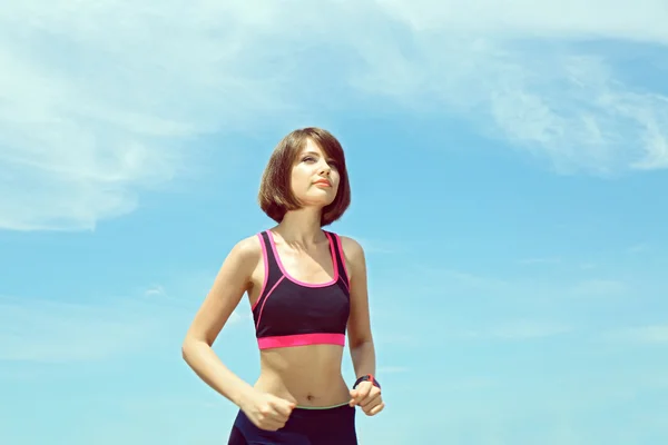 Young woman jogging outdoors