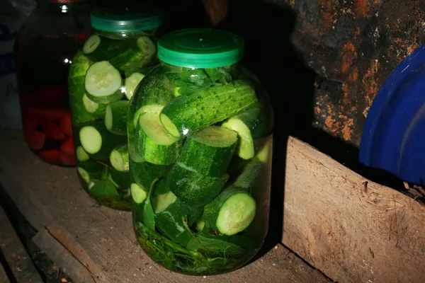 Home preserved cucumbers in glass jars