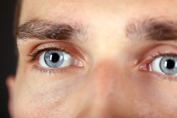 Beautiful blue man eyes