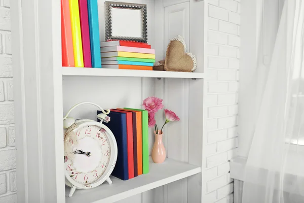 Books and decor on shelves