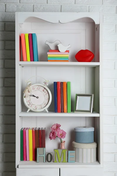 Books and decor on shelves