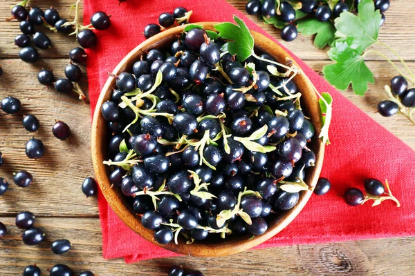 Ripe black currants in bowl