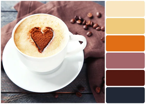 Cup of cappuccino with heart of cocoa