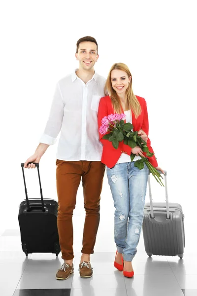 Couple with baggage in airport