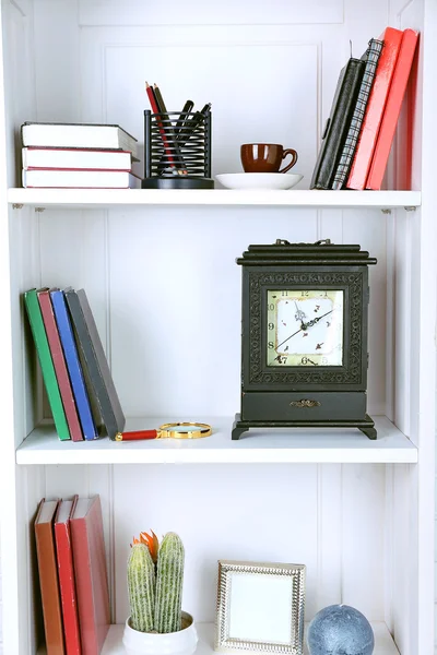 Books and decor on shelves