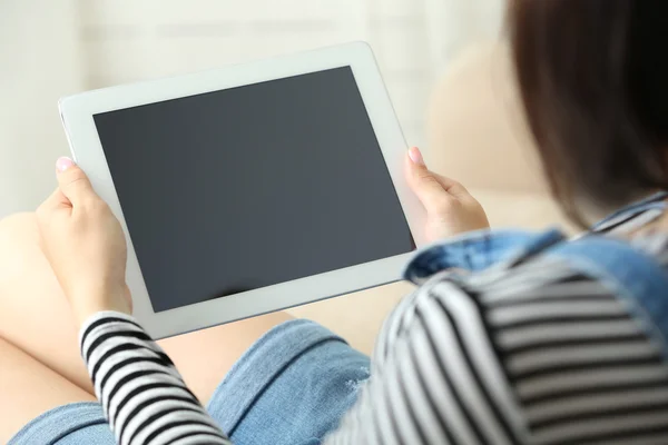 Female hands holding PC tablet