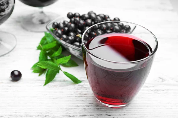 Fresh currant juice with berries