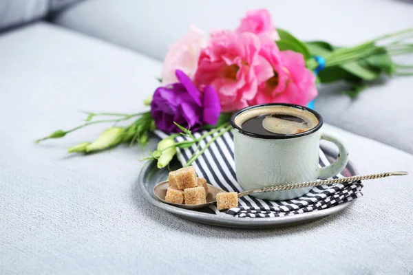 Cup of coffee with flowers