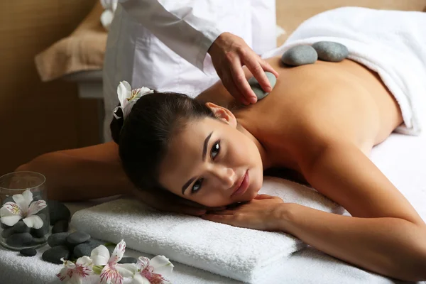 Young woman on massage table