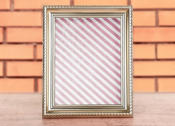 Old frame with striped canvas
