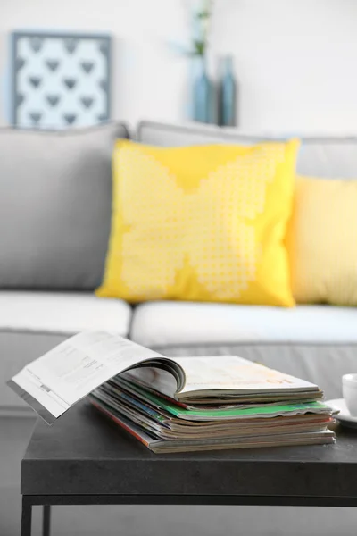 Magazines on table in living room