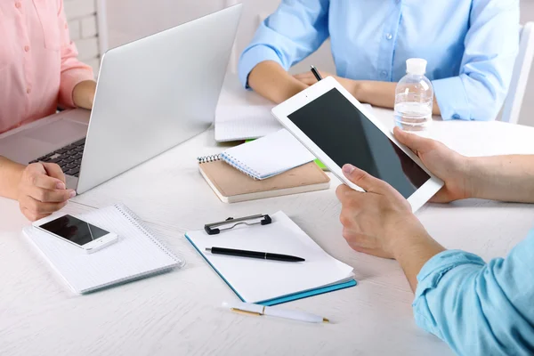 Work process of business meeting with electronic devices in office