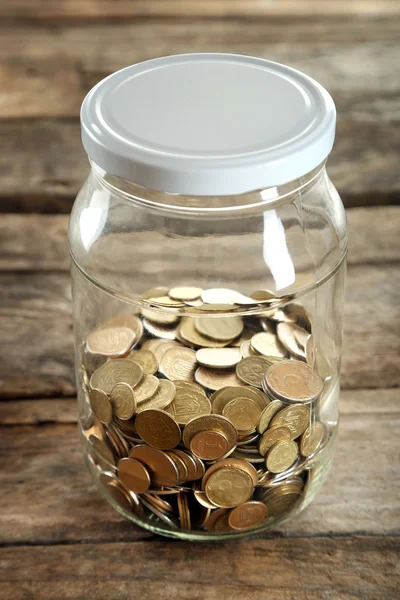 Coins in money jar