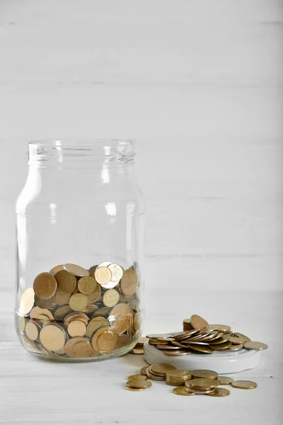 Coins in money jar