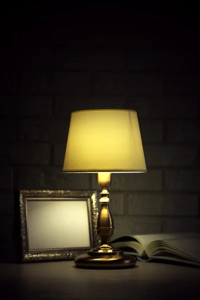 Old fashion table lamp on table