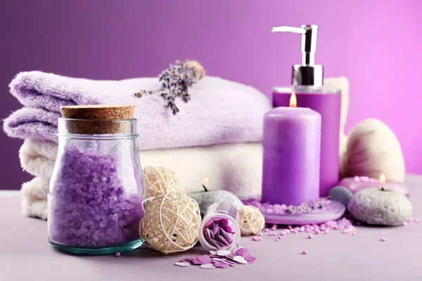 Spa treatments isolated on colorful background. Lavender spa concept