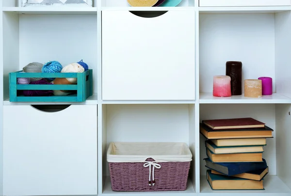 Shelves with different home objects