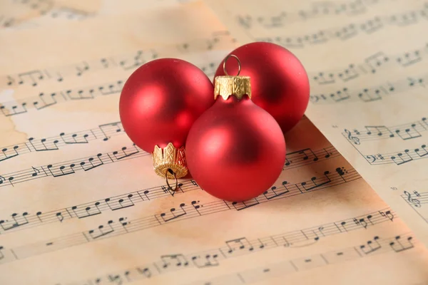 Christmas ball on music sheets