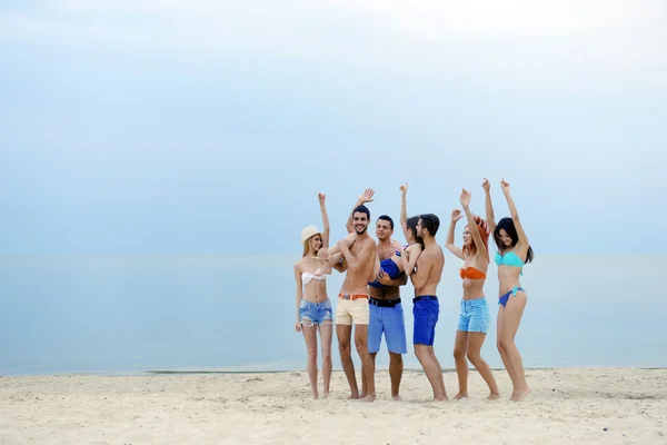 Young people having fun on beach