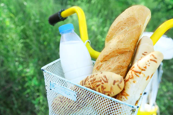 Basket of fresh foodstuffs on bike, outdoors