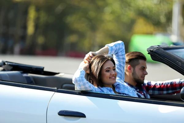 Couple in the car outside