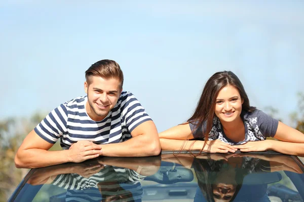 Couple in the car outside