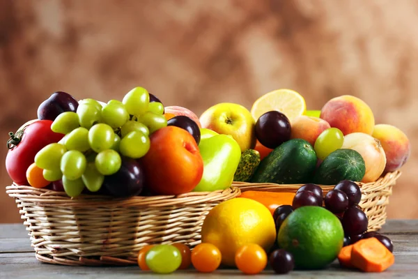Heap of fresh fruits and vegetables in basket