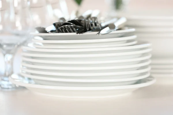 Clean plates, glasses and cutlery