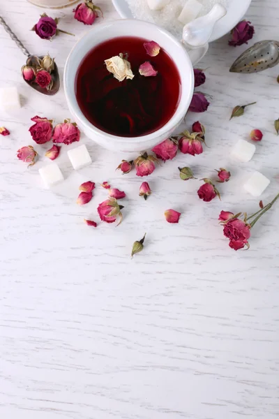 Tea and tea rose flowers