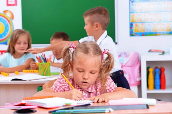 Group of children in classroom