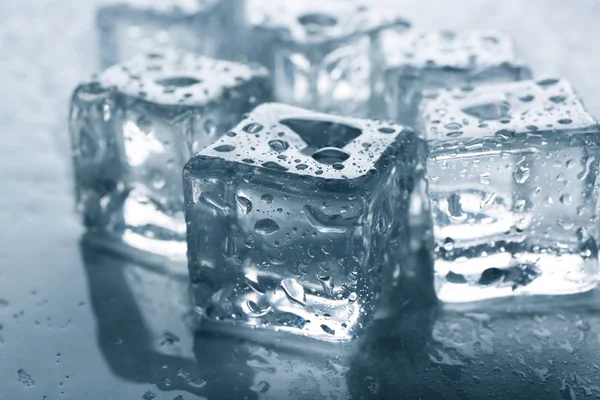 Melting ice cubes with drops