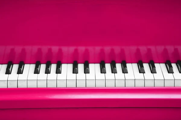 Piano keys of pink piano