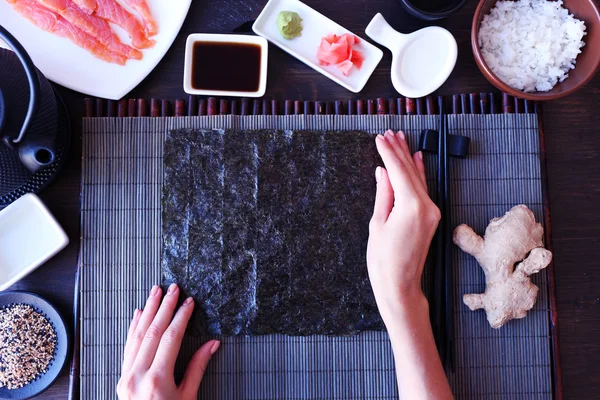 Main objects and ingredients for making sushi and rolls, top view