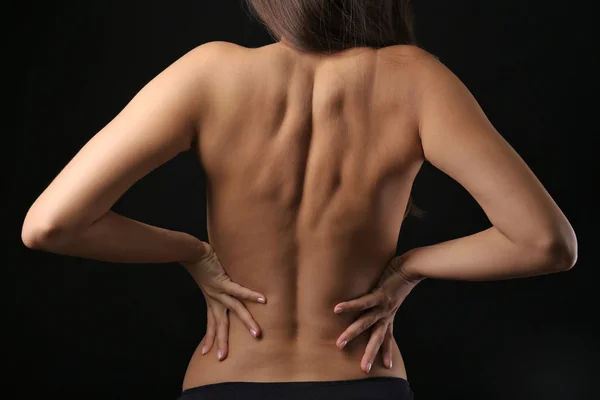 View on woman\'s nude back, close-up